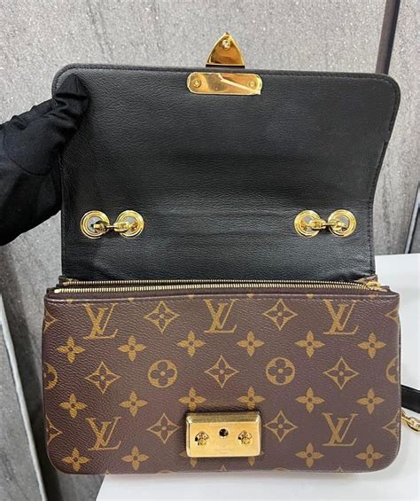 Products by Louis Vuitton: Marceau Bag.